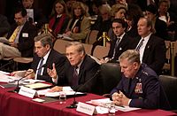 Secretary of Defense Donald Rumsfeld with Chairman of The Joint Chiefs of Staff General Richard B. Myers and Deputy Secretary of Defense Paul Wolfowitz testifying before the 9/11 Commission in March 2004.