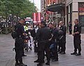 Denver Police bear riot gear during the 2008 Democratic National Convention