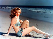 Marilyn Monroe posing for a postcard photograph c. 1940s