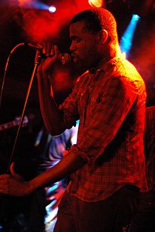 Tunde Adebimpe performing with TV on the Radio in 2004