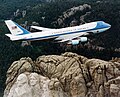 Image 1Air Force One, a Boeing VC-25, flying over Mount Rushmore. Boeing is a major aerospace and defense corporation, originally founded by William E. Boeing in Seattle, Washington.