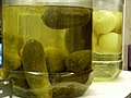 Large gherkins and pickled onions in a fish and chip shop in London