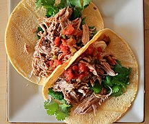 Tacos made with a carnitas filling