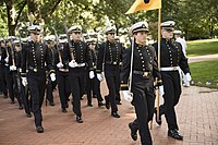 The United States Naval Academy commissions officers into the United States Marine Corps and United States Navy.