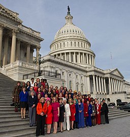 Before its release to news media, congressional staff digitally added into this 2013 official portrait the heads of four members absent in the original photo shoot.[89][90][91][92][93]