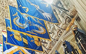 Heraldic flags hanging from the walls of the Henry VII Chapel