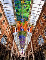 The abstract stained glass ceiling of the Victoria Quarter, Leeds (1990) by Brian Clarke, which spans the 400 foot length of the street to form a covered arcade