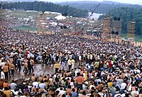 Millions participate in the Woodstock Festival of 1969.