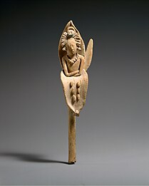 Jaina Island ceramic statuette of the young Maya maize god emerging from an ear of corn, 600–900 AD
