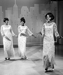 The Supremes singing on a soundstage