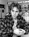 Image 74Jonathan Brandis in a Grunge-style flannel shirt and curtained hair in 1993 (from 1990s in fashion)
