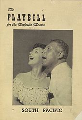 Cover of the Playbill for the original production at the Majestic Theatre. It bears a photograph of a man in his 50s (Pinza) beside a somewhat younger woman (Martin). Both are formally dressed and look upwards and to the left with their mouths open, as if singing together.