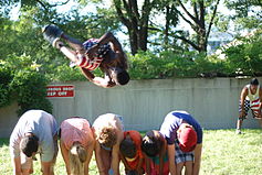 Acrobat jumping over volunteers in Washington, D.C.