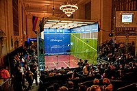 Glassed-in squash court in the Beaux-Arts-style hall