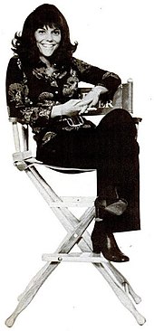 Publicity photograph of Karen Carpenter in a chair, 1973
