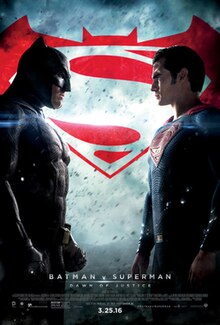 The two titular heroes, Batman and Superman, stand face-to-face confronting each other, with the film's logo (a red bat symbol combined with the letter 'S') behind them, and the film's title, credits, release date and billing below.
