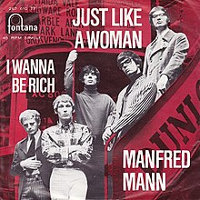 Cover of "Just Like a Woman", showing the band members on the back of a bus.