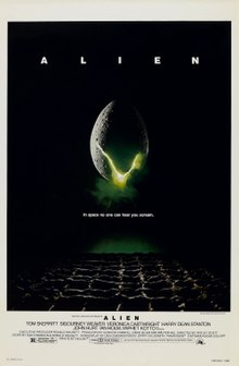 A large egg-shaped object that is cracked and emits a yellowish light hovers in mid-air against a black background and above a waffle-like floor. The title "ALIEN" appears in block letters above the egg, and just below it, the tagline appears in smaller type: "In space no one can hear you scream."