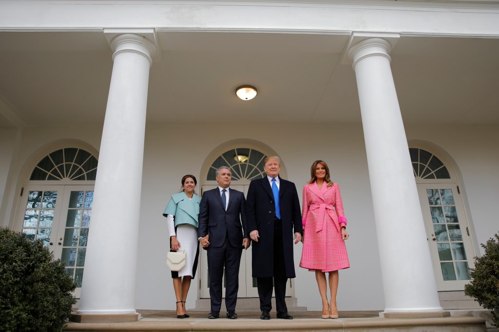 U.S. President Donald Trump and first lady Melania Trump stand with Colombian President Ivan Duque and his wife Maria Juliana Ruiz after their arrival at the White House in Washington, U.S.