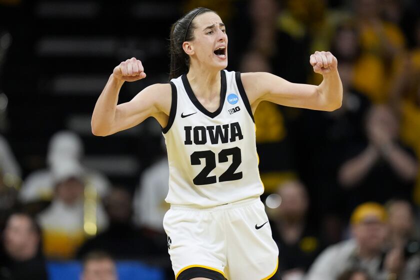 Iowa guard Caitlin Clark pumps both fist in the second half of a second-round college basketball game