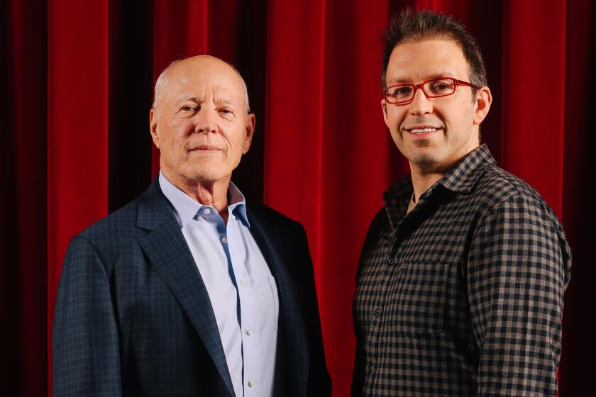 Magician Helder Guimaraes and Academy Award-winning director Frank Marshall pose for a portrait at the Geffen Playhouse.