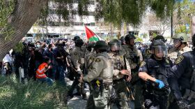 San Diego Sheriff officers and University of California police are seen on UC San Diego's campus with pro-Palestinian protestors. May 6, 2024.