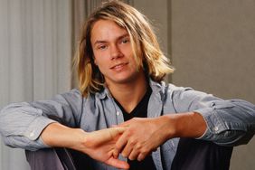 Actor River Phoenix (1970 - 1993), star of "Stand By Me," playfully poses during a 1988 Los Angeles, California, photo portrait session. Phoenix, a rising young film star, tragically died in 1993 outside a Sunset Strip nightclub of a drug overdose.