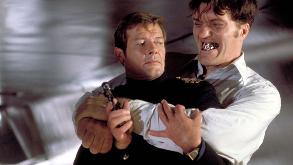 Roger Moore as James Bond, Richard Kiel as Jaws, The Spy Who Loved Me (1977)