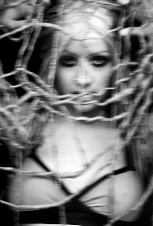 Christina Aguilera in a black and white photograph