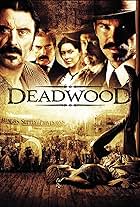 Powers Boothe, Keith Carradine, Ian McShane, Timothy Olyphant, and Molly Parker in Deadwood (2004)