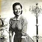 Joan Taylor appeared in 18 episodes of THE RIFLEMAN playing Milly Scott, Owner of the General Store bought from Hattie Denton.