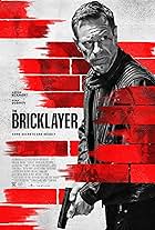 Aaron Eckhart and Nina Dobrev in The Bricklayer (2023)