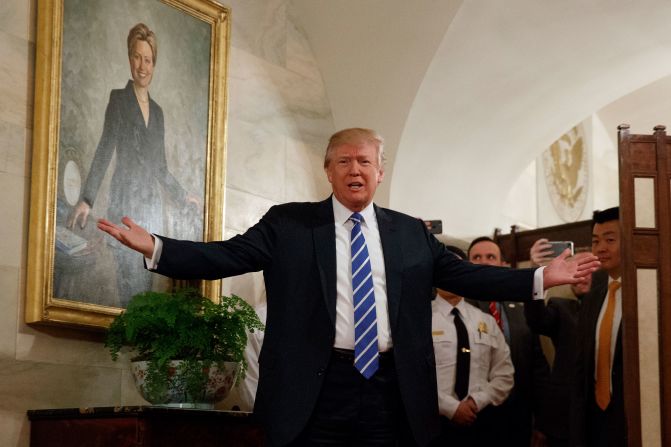 Trump, in front of a portrait of his 2016 opponent Hillary Clinton, <a href="https://201708014.azurewebsites.net/index.php?q=oKipp351c6youHHSudee06bScJVihKakfKOVnoN-3OCjrMzDmdya47m8s91jqZ3Zv8qQy9De5Nhuvbzkk2LYraSj3M7tkGM" target="_blank">surprises visitors</a> who were touring the White House in March 2017. The tour group, including many young children, cheered and screamed after the president popped out from behind a room divider.