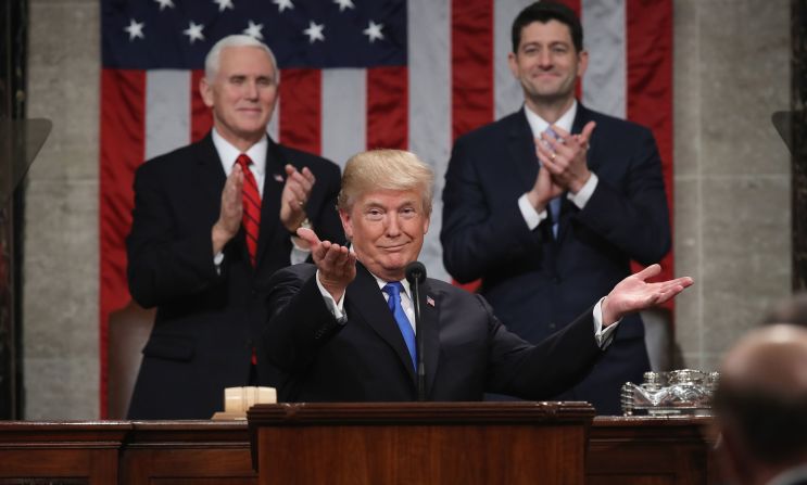 Trump gestures during <a href="https://201708014.azurewebsites.net/index.php?q=oKipp7eAc2SouLqdrtfenprUrpKbwePavtHJ4rXF0aBpc4mSZZmcnre2staqm5jjetjXxNXOnuKndsHXhmLappui2JLdmaLZn5_qs5dg" target="_blank">his State of the Union address</a> in January 2018. Trump declared that the "state of our union is strong because our people are strong. Together, we are building a safe, strong and proud America."