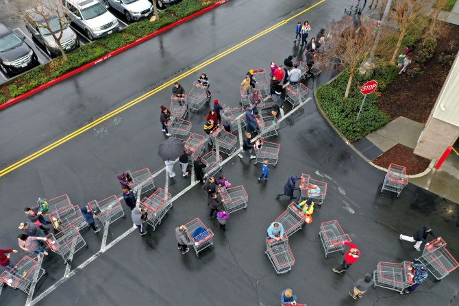 Hundreds of people lined up to enter a Costco in Novato, California, on March 14. Many people have been stocking up on food, toilet paper and other items. As a response to <a href="https://201708014.azurewebsites.net/index.php?q=oKipp7eAc2SouLqdrtfenprUrpJkg6Gle6CZnXyIm9mcpMTOnpjf3rCzq-FjopbgsNeQ1snY4-eisLLiTqPUrpefl8jpnaPXmKbftpmkdLS9usNotq_flq1ynrixng" target="_blank">panic buying,</a> retailers in the United States and Canada have started limiting the number of toilet paper that customers can buy in one trip.