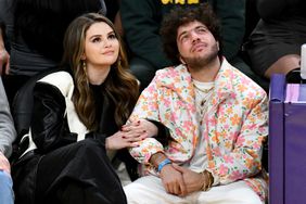 Selena Gomez and Benny Blanco attend a basketball game between the Los Angeles Lakers and the Miami Heat