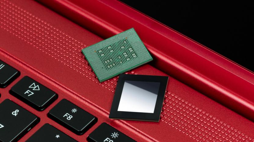Qualcomm Snapdragon 8cx Gen 3 chipset on top of a red laptop.