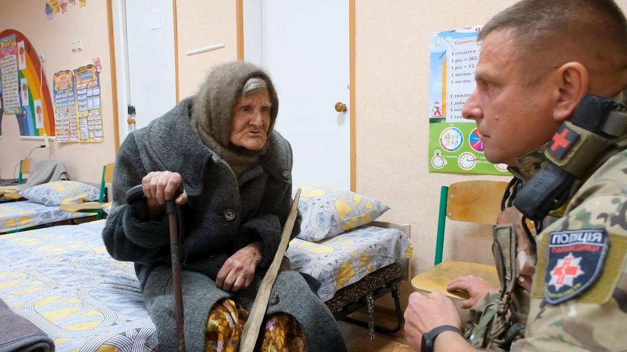 Ukraine.  A 98-year-old woman fled Russian-occupied territory.  I walked 10 km
