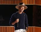 Pharrell Williams on stage at the 56th annual Grammy Awards in Los Angeles. Oscars producers said Tuesday that Williams will sing his nominated song ‘Happy’ live on March 2.