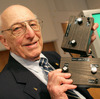 German-American game developer Ralph Baer shows the prototype of the first games console which was invented by him during a press conference on the Games Convention Online in Leipzig, Germany in 2009. Baer died on Saturday. He was 92.