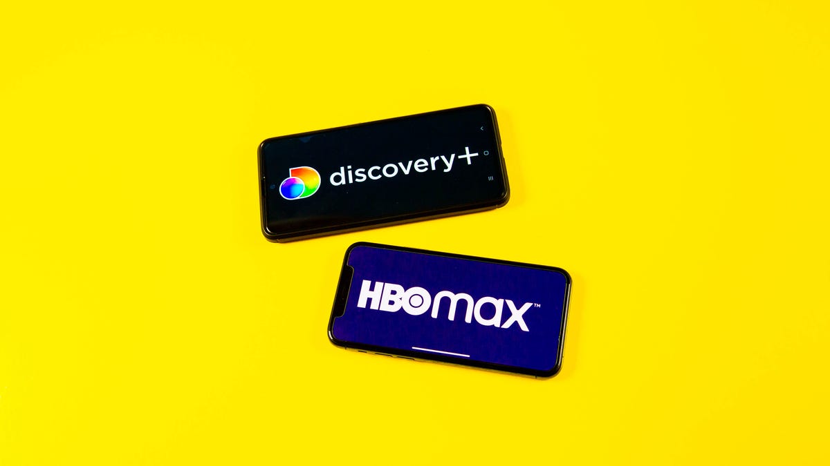 HBO Max and Discovery Plus logos on two phones