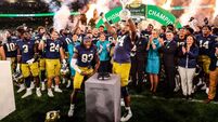 Notre Dame lift the trophy after winning 26/8/2023